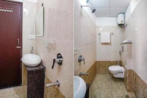 海得拉巴的住宿－FabHotel Rooms 27，一间带卫生间和水槽的浴室