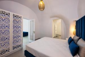 Katil atau katil-katil dalam bilik di Palm Island Suites