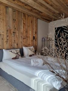 Posteľ alebo postele v izbe v ubytovaní ApartSki 18d