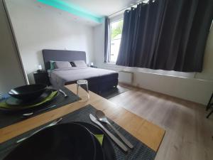 Kuchyň nebo kuchyňský kout v ubytování Le Cosy - Queen-size, full équipé, wifi, parking