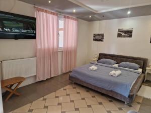 Posteľ alebo postele v izbe v ubytovaní Studio Apartman Grgurić