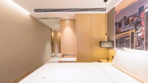 Postel nebo postele na pokoji v ubytování Atour Hotel Chengdu Jiuyanqiao NetEase Selected