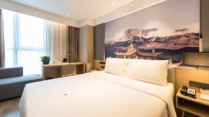 Postel nebo postele na pokoji v ubytování Atour Hotel Chengdu Jiuyanqiao NetEase Selected