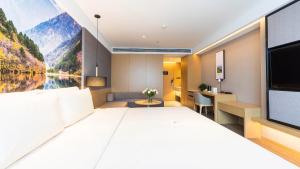 Postel nebo postele na pokoji v ubytování Atour Hotel Chengdu Jiuyanqiao NetEase Selected