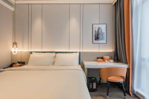 Giường trong phòng chung tại Atour X hotel Shanghai Wujiaochang INNO Chuangzhi +9 ảnh