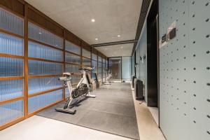 a gym with treadmills and a treadmill at Atour X hotel Shanghai Wujiaochang INNO Chuangzhi in Shanghai