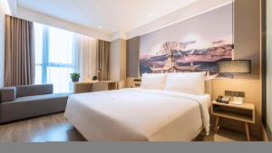 Postel nebo postele na pokoji v ubytování Atour Hotel Chengdu Jiuyanqiao NetEase Selected