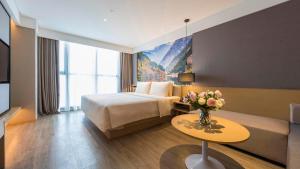 Postel nebo postele na pokoji v ubytování Atour Hotel Chengdu Jiuyanqiao NetEase Selected