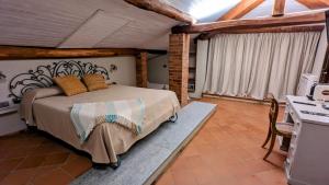 Postel nebo postele na pokoji v ubytování Agriturismo Peq Agri-Resort Tovo