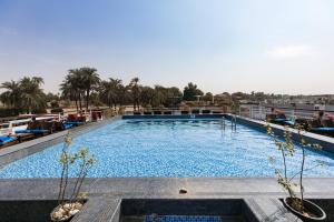 a large swimming pool on top of a building at Casa Sol Nile Cruise 4nt Lxr Saturday 3nt Asw Wednesday in Aswan