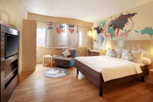 Giường trong phòng chung tại Ibis Jakarta Harmoni