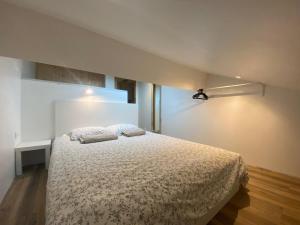 Voodi või voodid majutusasutuse Bohobos Hostel toas