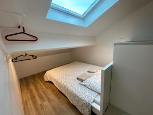 Voodi või voodid majutusasutuse Bohobos Hostel toas