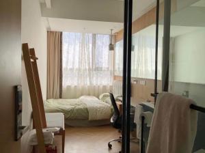 Letto o letti in una camera di Suzhou MeetU Intl Youth Hostel
