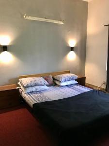 Postel nebo postele na pokoji v ubytování Durrani House
