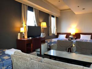 TV a/nebo společenská místnost v ubytování Hotel 28 Hiroshima