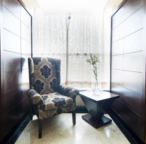 Posezení v ubytování Hotel Raya Inn
