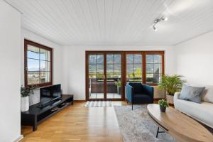 Oleskelutila majoituspaikassa Sonniges Apartment mit traumhaftem Bergblick