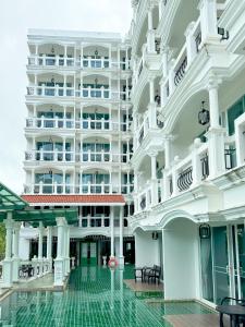 an external view of a building at Grand Supicha City Hotel - SHA Plus in Phuket