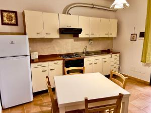 Kuchyň nebo kuchyňský kout v ubytování Carpine Agriturismo Bio in Maremma