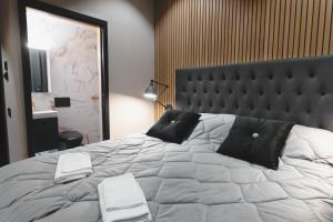 Postel nebo postele na pokoji v ubytování Royal Penthouse Apartment + 27 fotografií