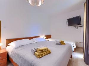 Postel nebo postele na pokoji v ubytování Apartment Alba-2 by Interhome