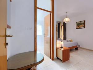 Postel nebo postele na pokoji v ubytování Apartment Alba-2 by Interhome