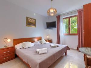 Postel nebo postele na pokoji v ubytování Apartment Alba-5 by Interhome