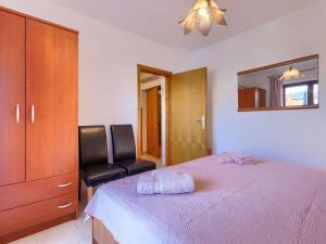 Postel nebo postele na pokoji v ubytování Apartment Alba-5 by Interhome