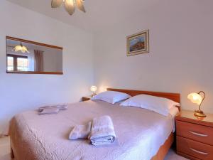 Postel nebo postele na pokoji v ubytování Apartment Alba-5 by Interhome
