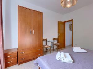 Postel nebo postele na pokoji v ubytování Apartment Alba-5 by Interhome