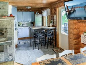 A kitchen or kitchenette at Holiday Home Vastaniemi by Interhome