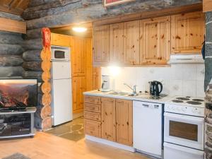 Kuchyň nebo kuchyňský kout v ubytování Holiday Home Tokkapirtti 3 by Interhome + 12 fotografií