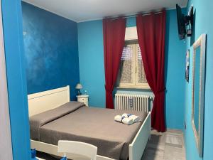 A bed or beds in a room at Residenza Manfredi