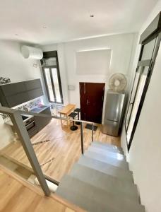 A television and/or entertainment centre at Loft Alameda en Sevilla