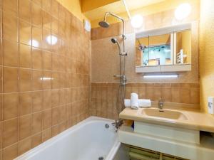 A bathroom at Apartment Home Club - Lavachet-10 by Interhome