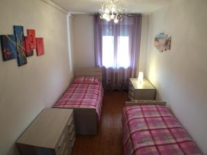A bed or beds in a room at Appartamenti Giacomo Noventa