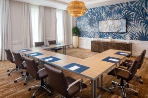 a conference room with a large table and chairs at Wild Dunes Resort - Residences at Sweetgrass in Isle of Palms