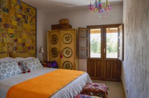 En eller flere senger på et rom på Los Diezmos