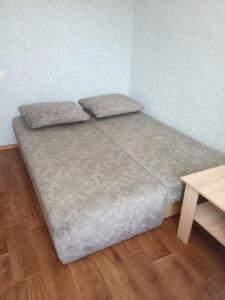Posteľ alebo postele v izbe v ubytovaní Apartment Harkovskaya 1 floor