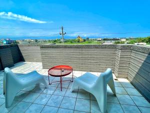 Balcone o terrazza di 宜蘭包棟民宿 安娜貝絲 獨棟l KTV唱到飽l電動麻將l全套廚房l看電影l遊戲機l 烤肉BBQ l國旅卡特約