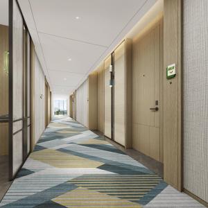 an empty hallway in a building with wooden doors at Holiday Inn Chengdu East, an IHG Hotel in Chengdu