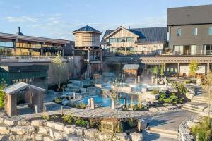 a resort with a water park with a water fountain at 3 Bedroom Well-designed Townhouse in Whitby in Whitby
