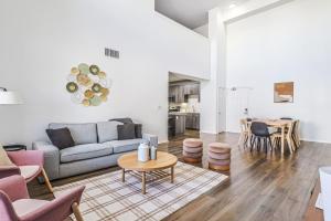 a living room with a couch and a table at Housy & Comfy 4BDR & 2BTH in Marina del Rey for 10 pax in Los Angeles