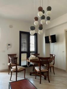 TV a/nebo společenská místnost v ubytování Chiaro di Luna Guest House