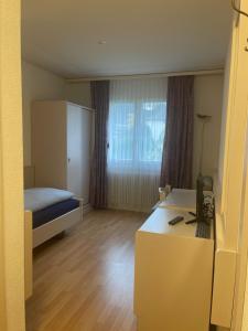 Katil atau katil-katil dalam bilik di Hôtel les Berges