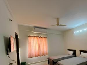 TV a/nebo společenská místnost v ubytování SS Happy Home's PG/Paying Guest