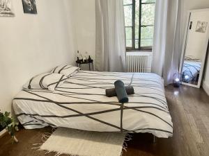 Cama ou camas em um quarto em Montreux appartement centre lac