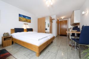 Postel nebo postele na pokoji v ubytování Apartments Aura