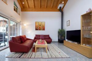 TV a/nebo společenská místnost v ubytování Apartments Aura